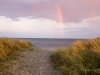 Strand mit Regenbogen